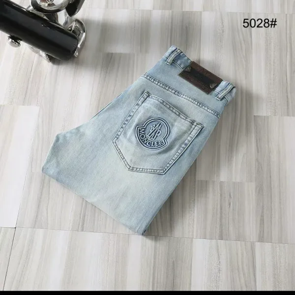 Moncler Logo-Embroidered Light Wash Jeans - 1