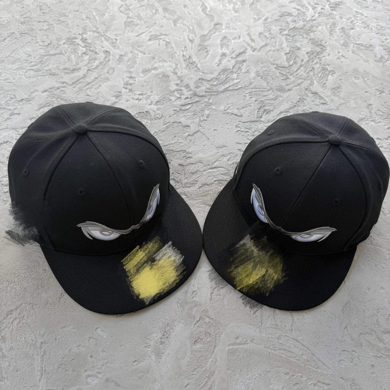 Embroidered Eyes Black Baseball Cap, Flat Brim, Painted Yellow Splash Detail, Urban Streetwear 1