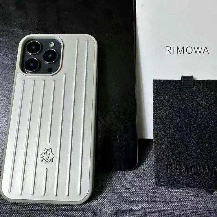 RIMOWA Phone Cases Ribbed aluminum alloy case compatible with iPhone 12–16 Pro Max — Silver
