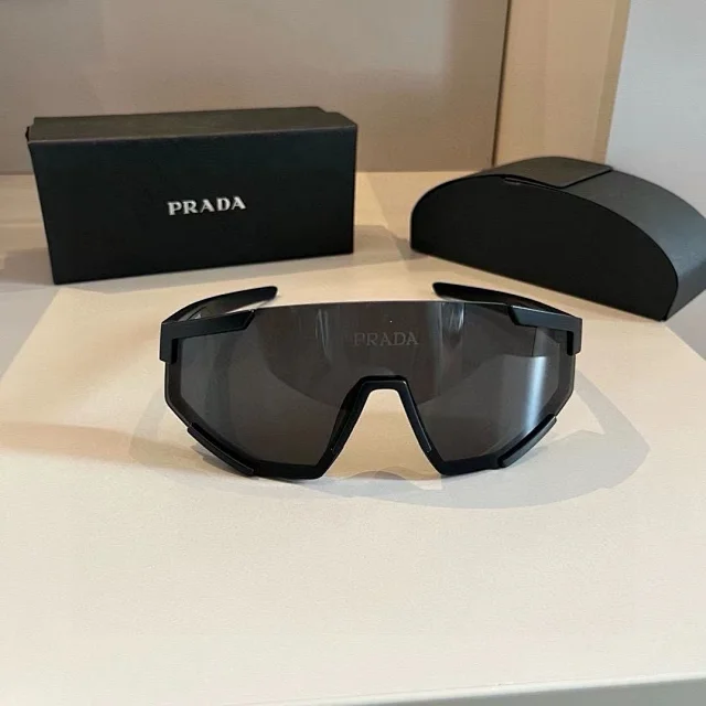 Prada Eyewear Shield sport sunglasses with red temple stripe product detail image 1