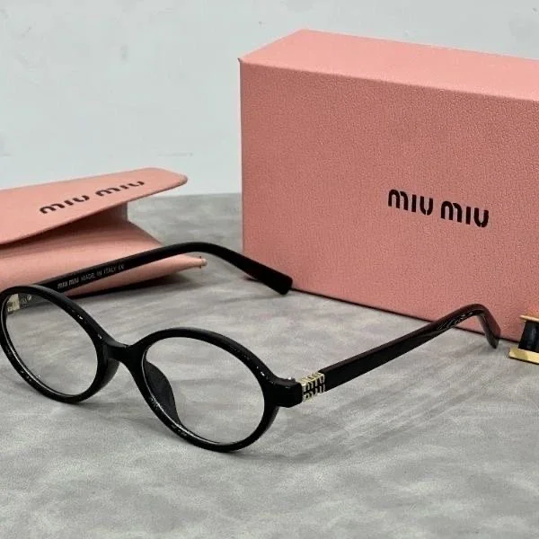 Miu Eyewear Oval sunglasses with striped metal temple detail product detail image 5