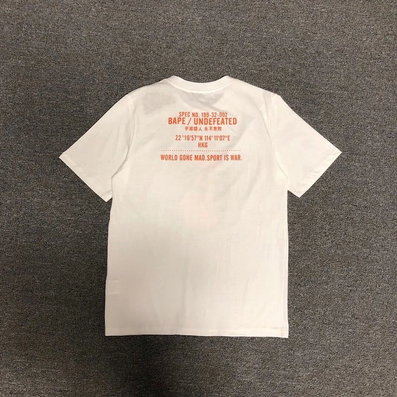 A Bathing Ape x Undefeated Camo Ape Head Orange Black T-Shirt product detail 6 in Litbuy spreadsheet finds