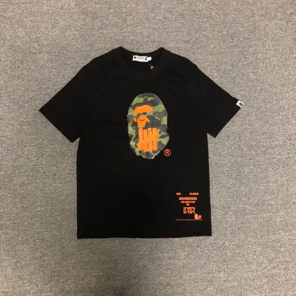A Bathing Ape x Undefeated Camo Ape Head Orange Black T-Shirt - 4