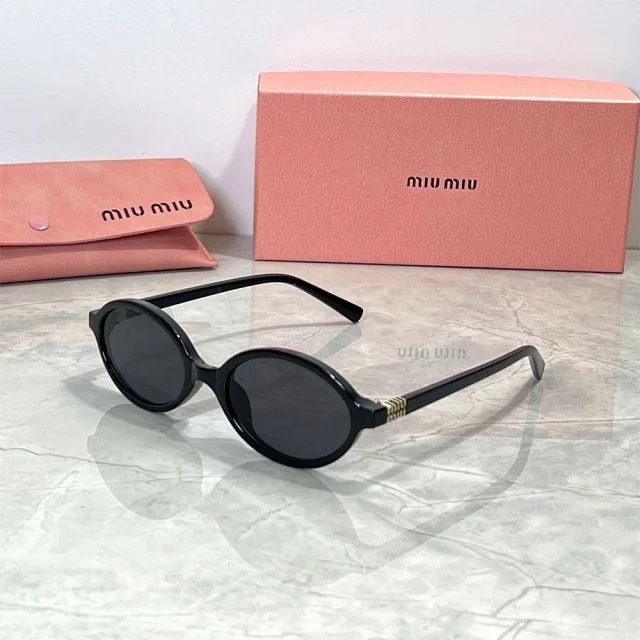 Miu Eyewear Oval sunglasses with striped metal temple detail product detail image 2