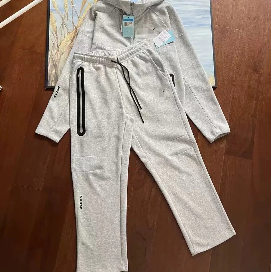 Light gray suit with flat feet
