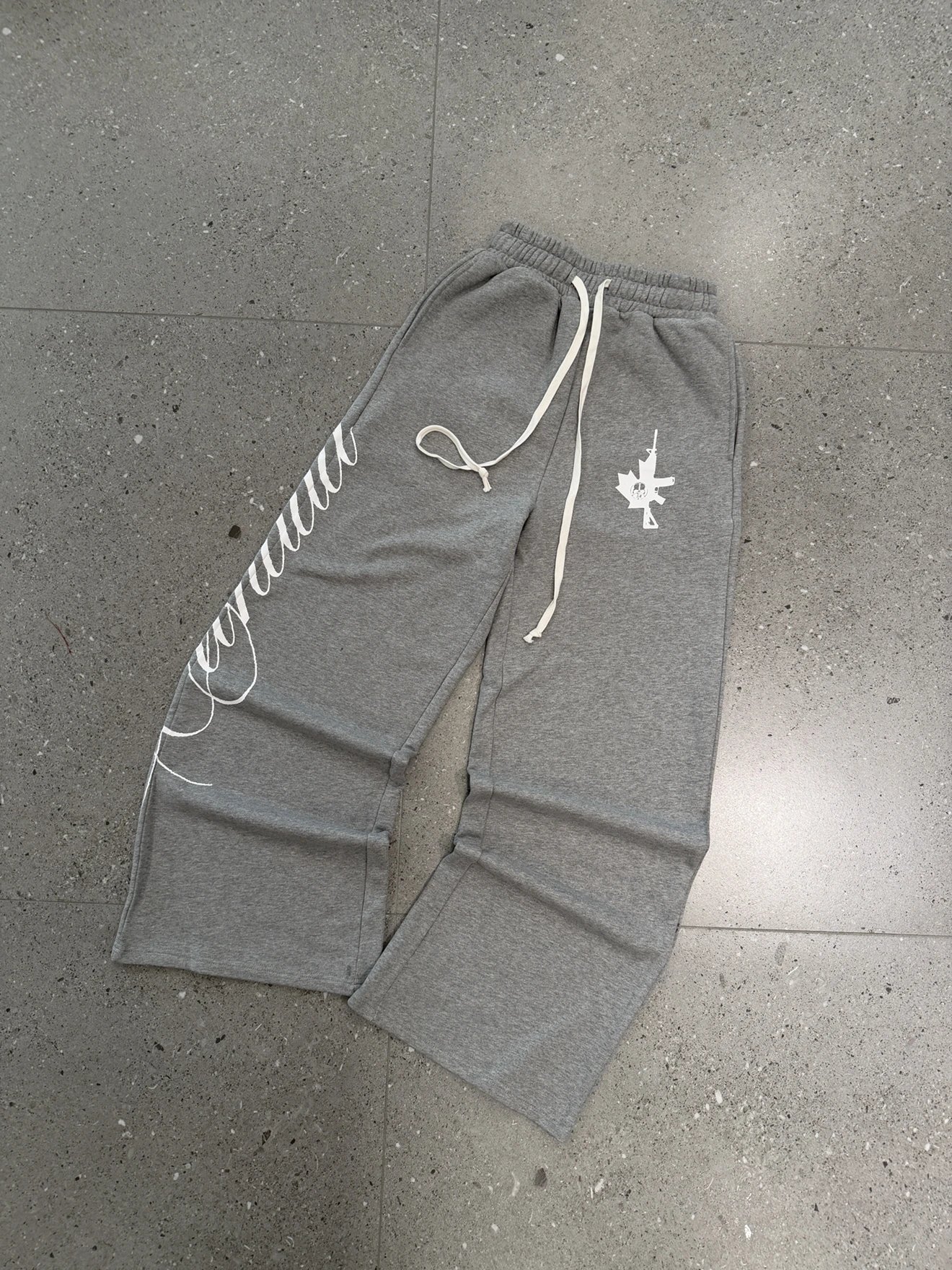 Grey Sweatpants with White Script and Maple Leaf Gun Graphic Casual Joggers