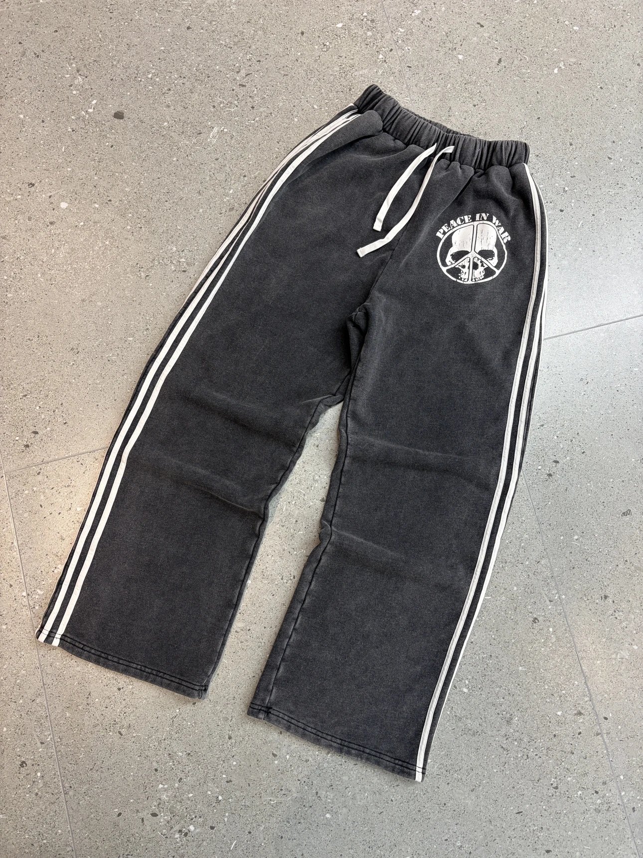 骷髅反战水洗卫裤