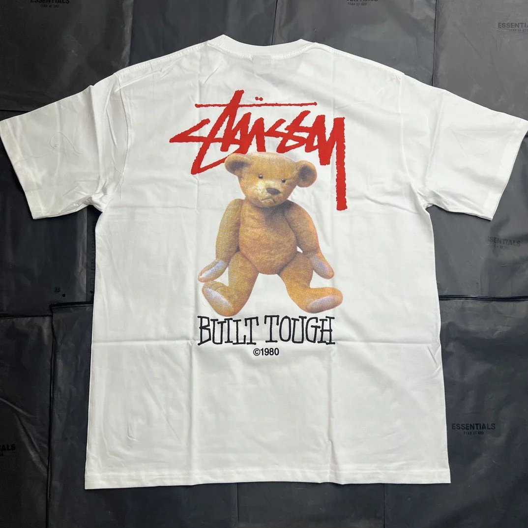 **Made by ** Stussy Bear New Patterned Round Neck Printed Short Sleeve Stussy originated from the su