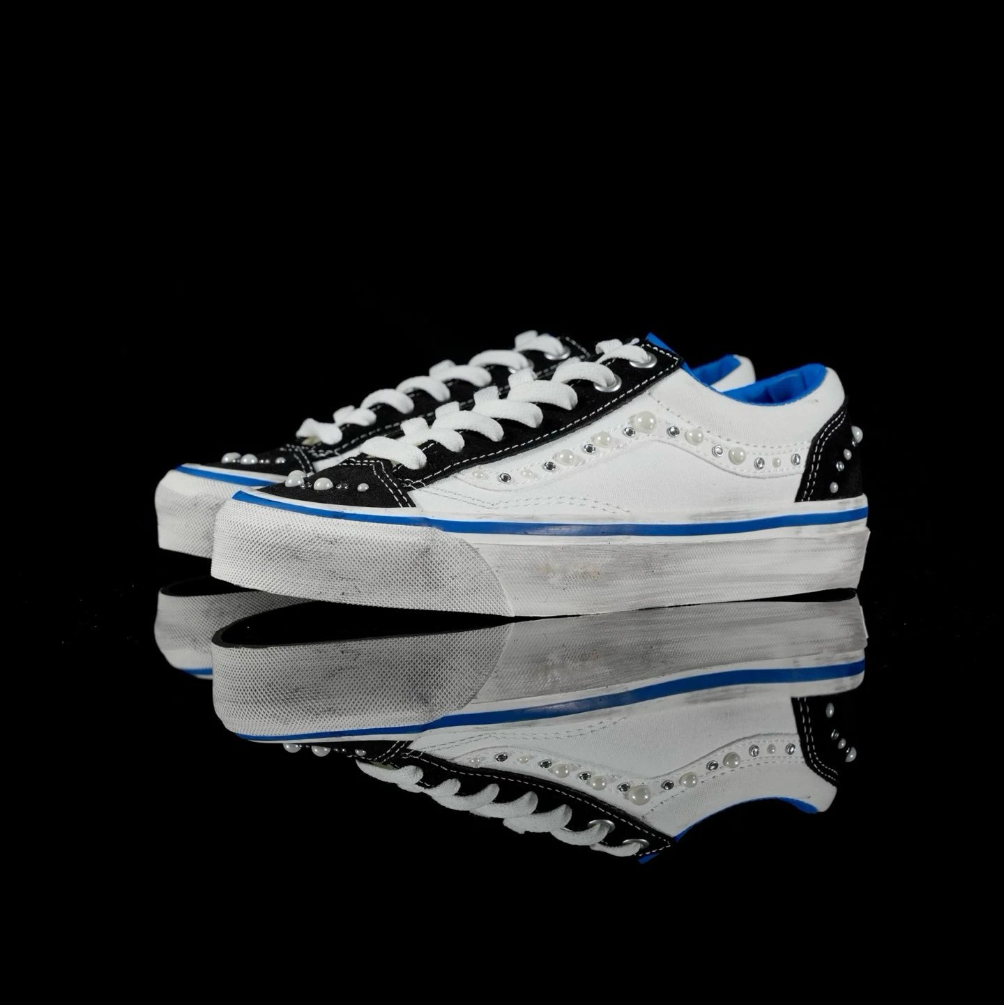 White, black, and blue rivets