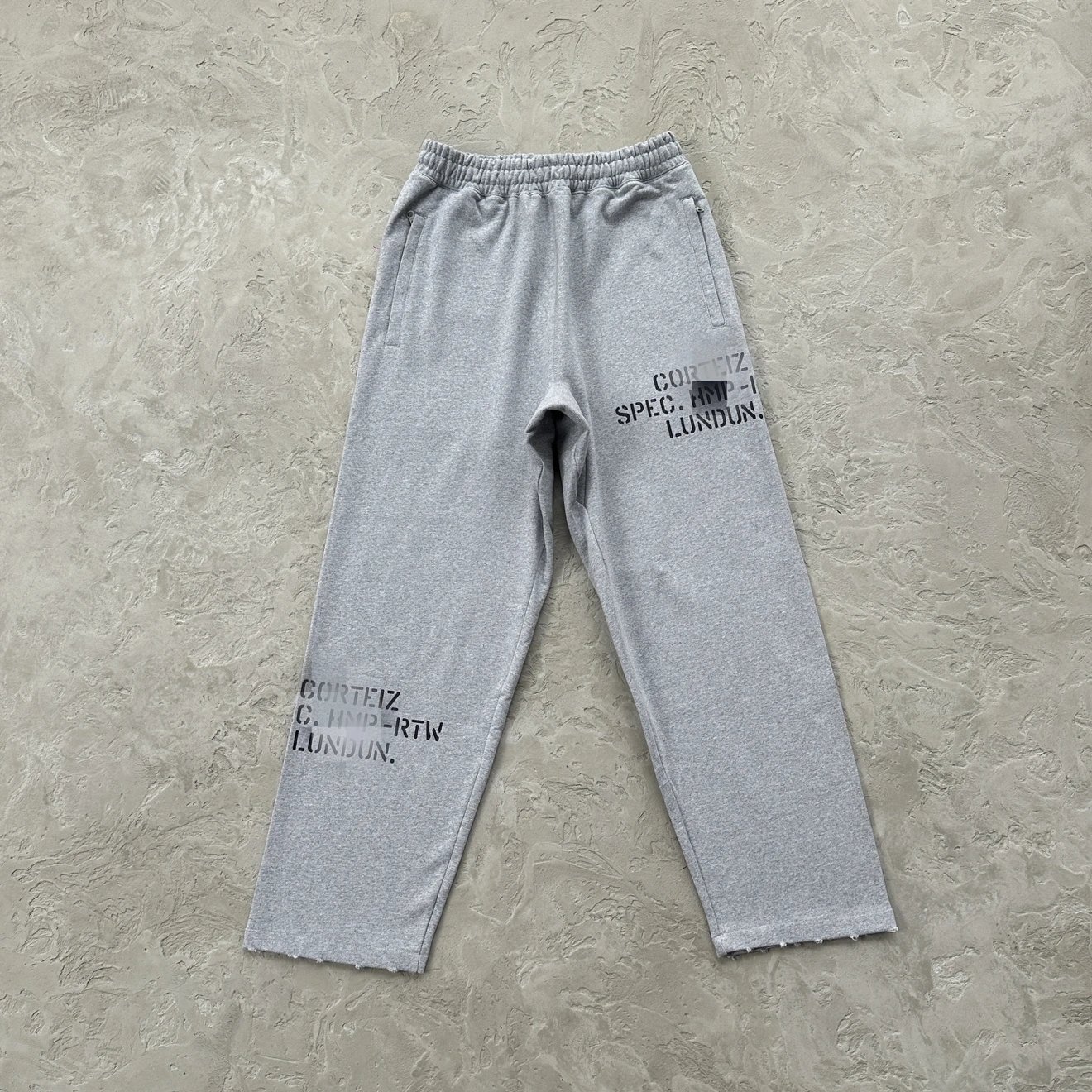HMP cracked printed edge straight leg sweatpants