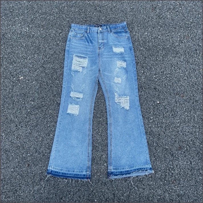 Distressed Wide-Leg Flared Jeans in Light Wash Blue - 1