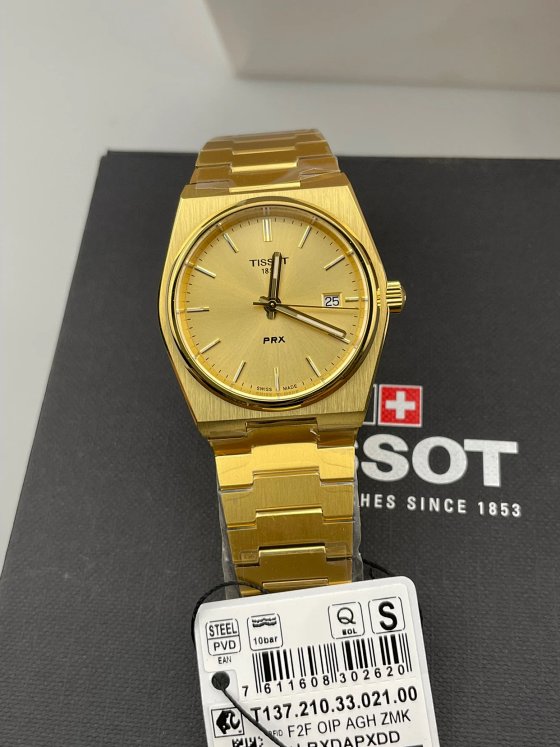 35mm Tissot T137.210 PRX Series Gold Women's Watch, Very Popular, Near Gold Yellow, Very Beautiful, Brushed and Polished Finish, Perfect, Three-dimensional Angular Design, Sapphire Crystal, Swiss ETA F05.115 Movement, 50m Water Resistance, Quick-release Spring Bars, Butterfly Clasp, Triple Code Matching