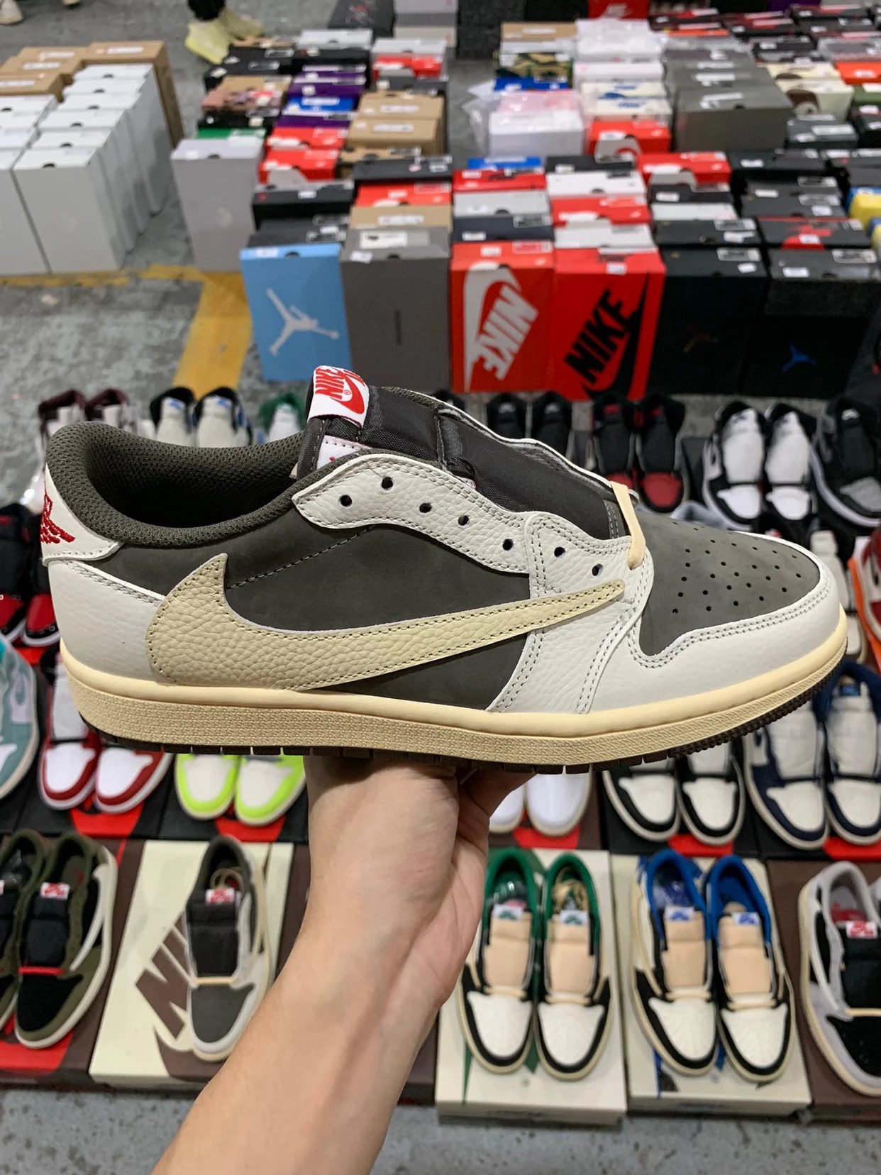 Travis Scott x Air Jordan 1 Low Reverse Swoosh Sneakers