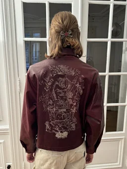 thumbnail for The final model is ERD Principles of Love in red leather jacket