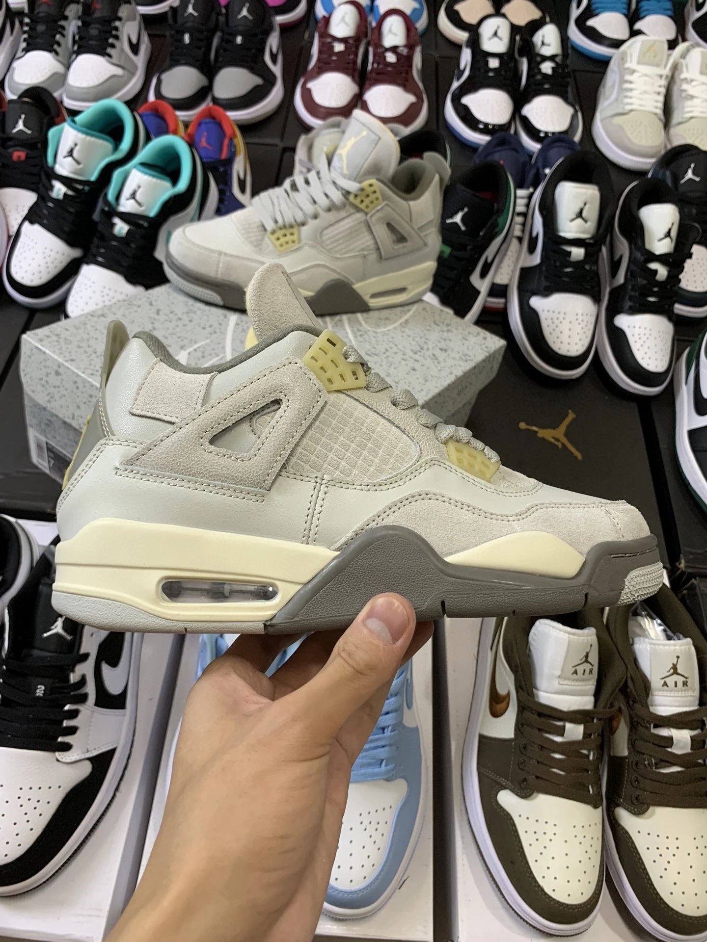 Air Jordan 4 Retro Craft Rabbit Grey Sneakers