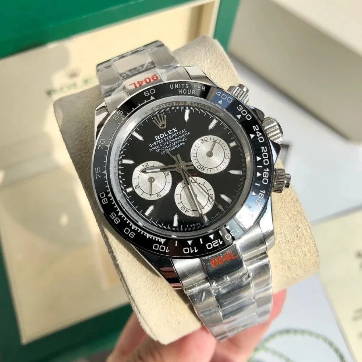 Silver shell, black plate, white circle