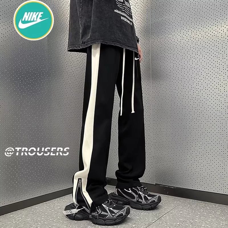 NIKE耐克海外版夏季冰丝拉链开叉骑兵斜直筒型ins长裤休闲裤运动裤 男女同款
 耐克经典钩子Logo 夏季新款 垂感冰丝 轻盈舒适 快手小红书网红上身款  质感 7