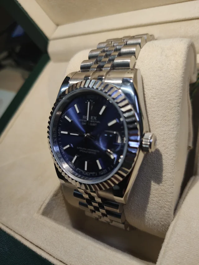 Rolex Watches Oyster Perpetual Datejust-style watch with fluted bezel, date magnifier, and jubilee bracelet product detail image 79