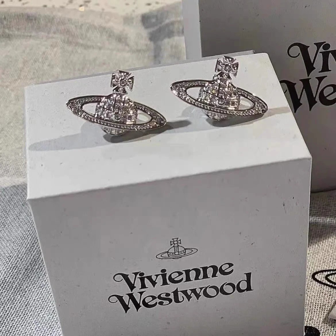 West * rear ear studs with complete packaging 🔸 West * Rear Jewelry