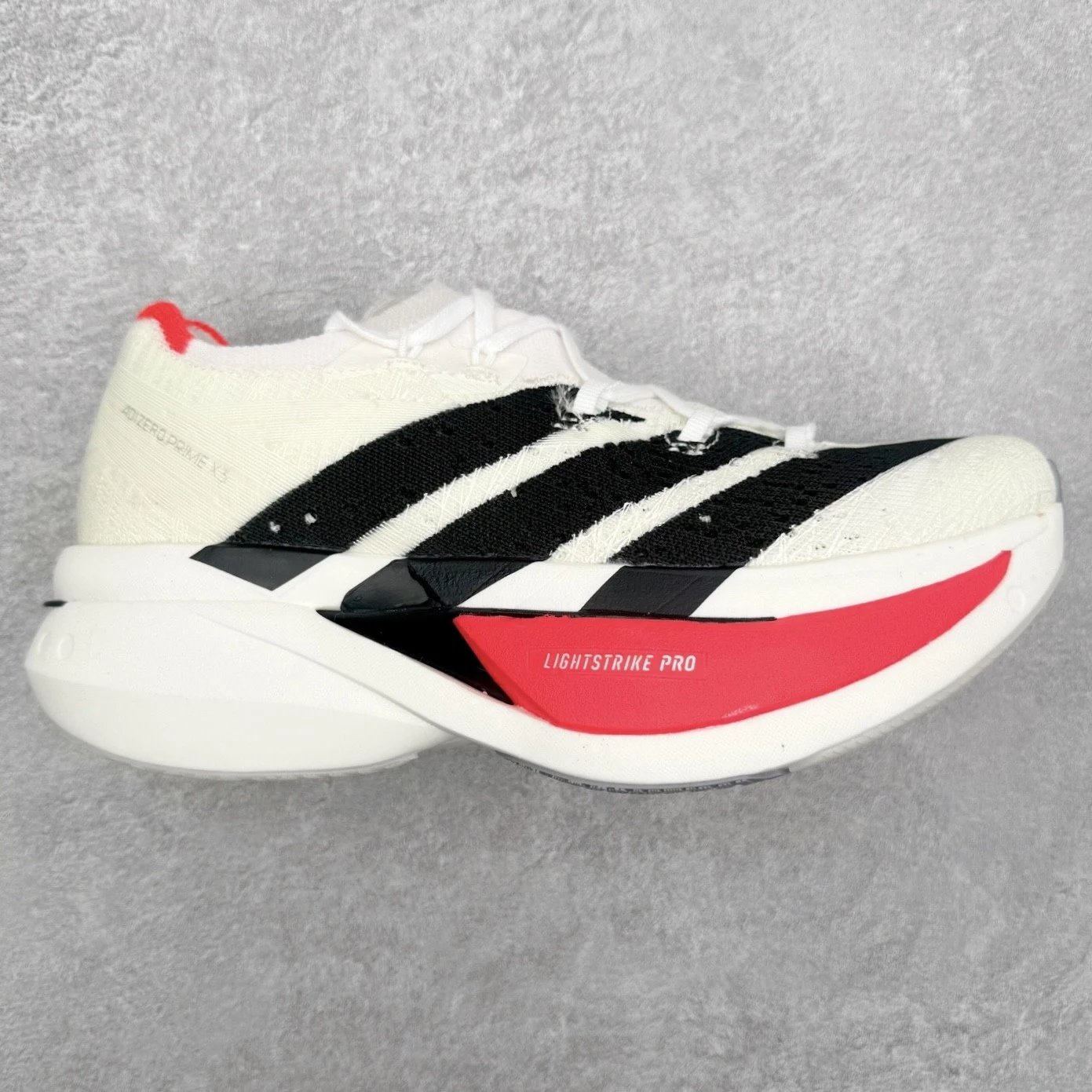 adidas Sneakers Adizero Prime X 3.0 Running Shoes — White, black, and red