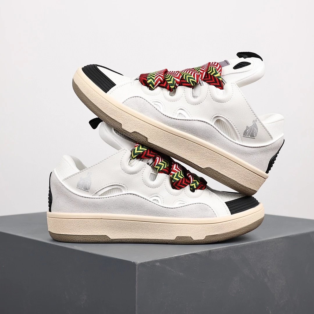 Lanvin Sneakers Low-top with wavy paneling and patterned laces — Black and white