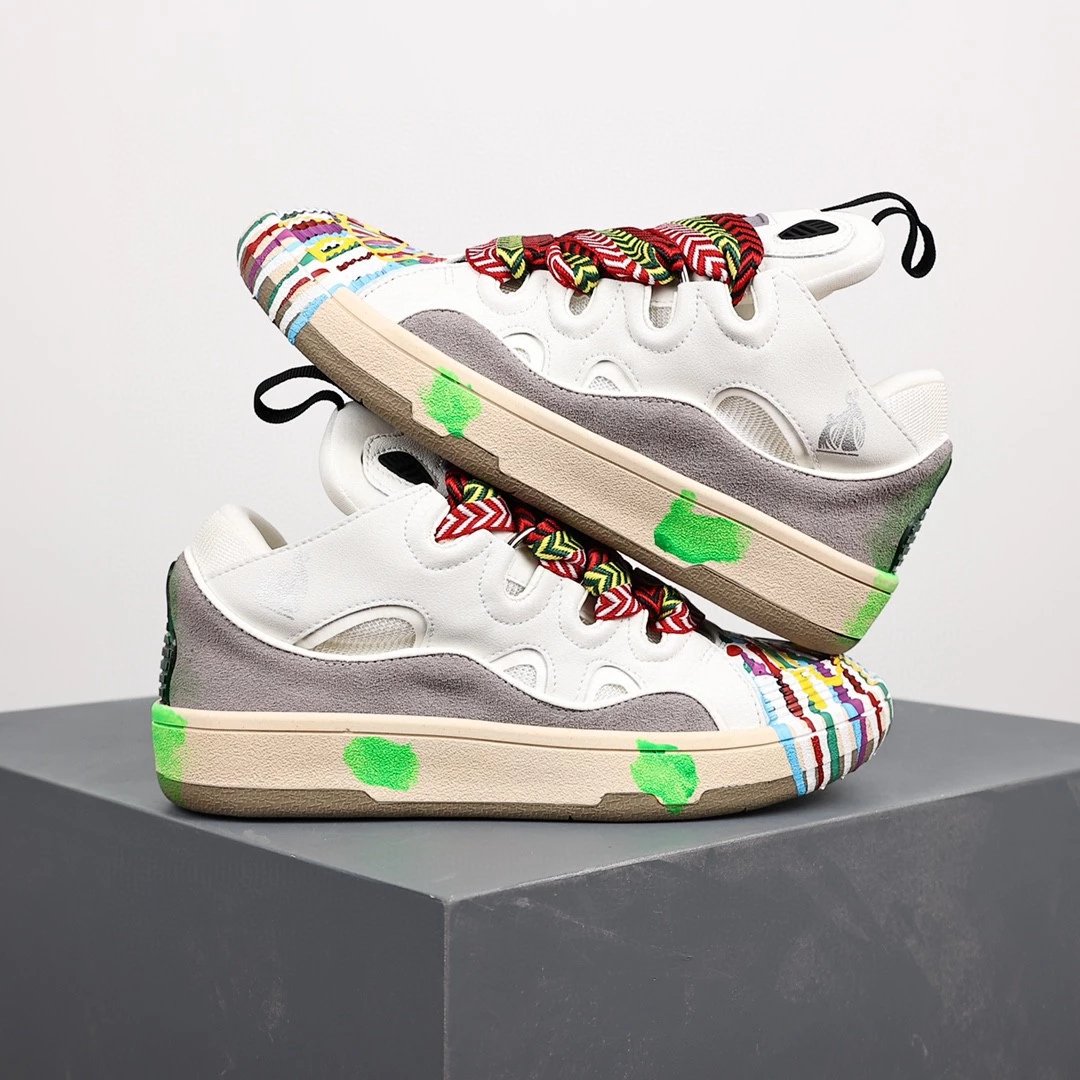Lanvin Sneakers Low-top with wavy paneling and patterned laces — White graffiti