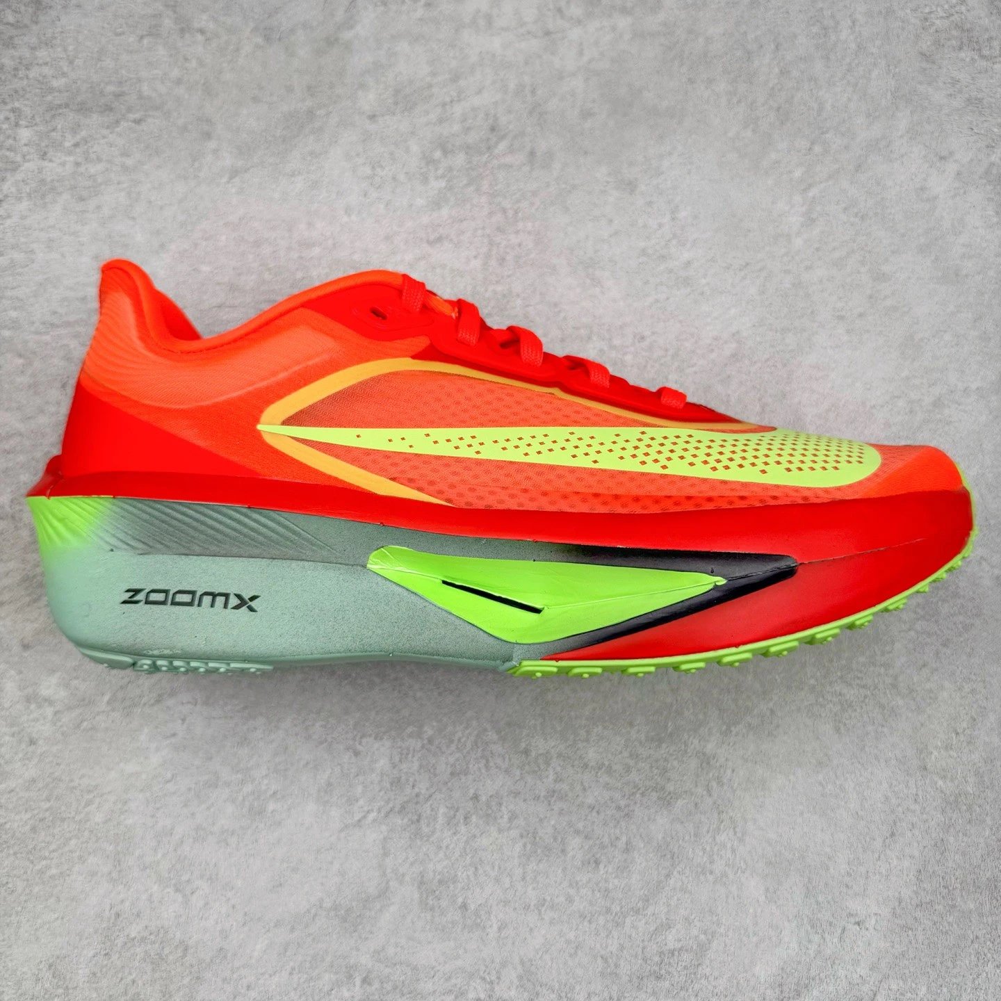 Nike Sneakers ZoomX low-top running with mesh upper and thick foam sole — orange green