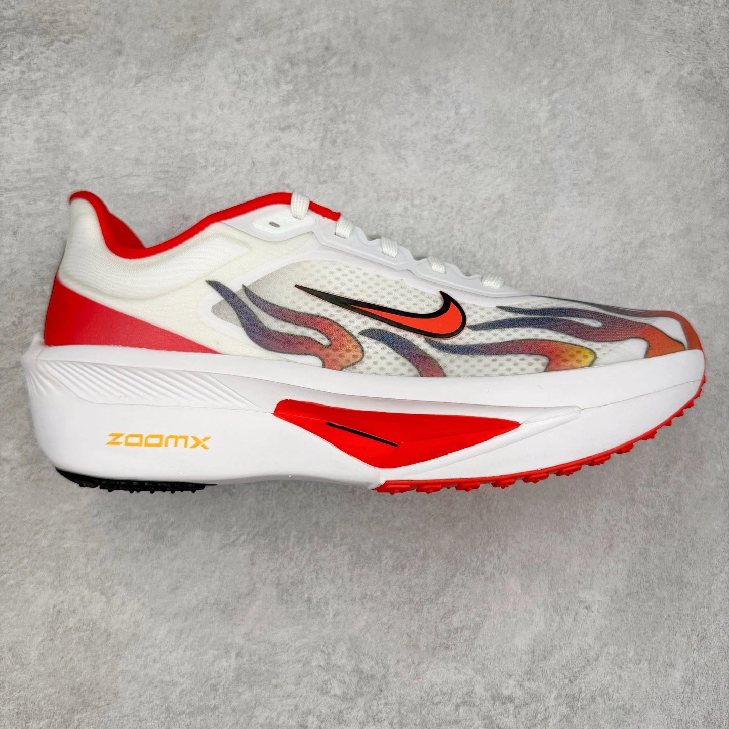 Nike Sneakers ZoomX low-top running with mesh upper and thick foam sole — white red flame