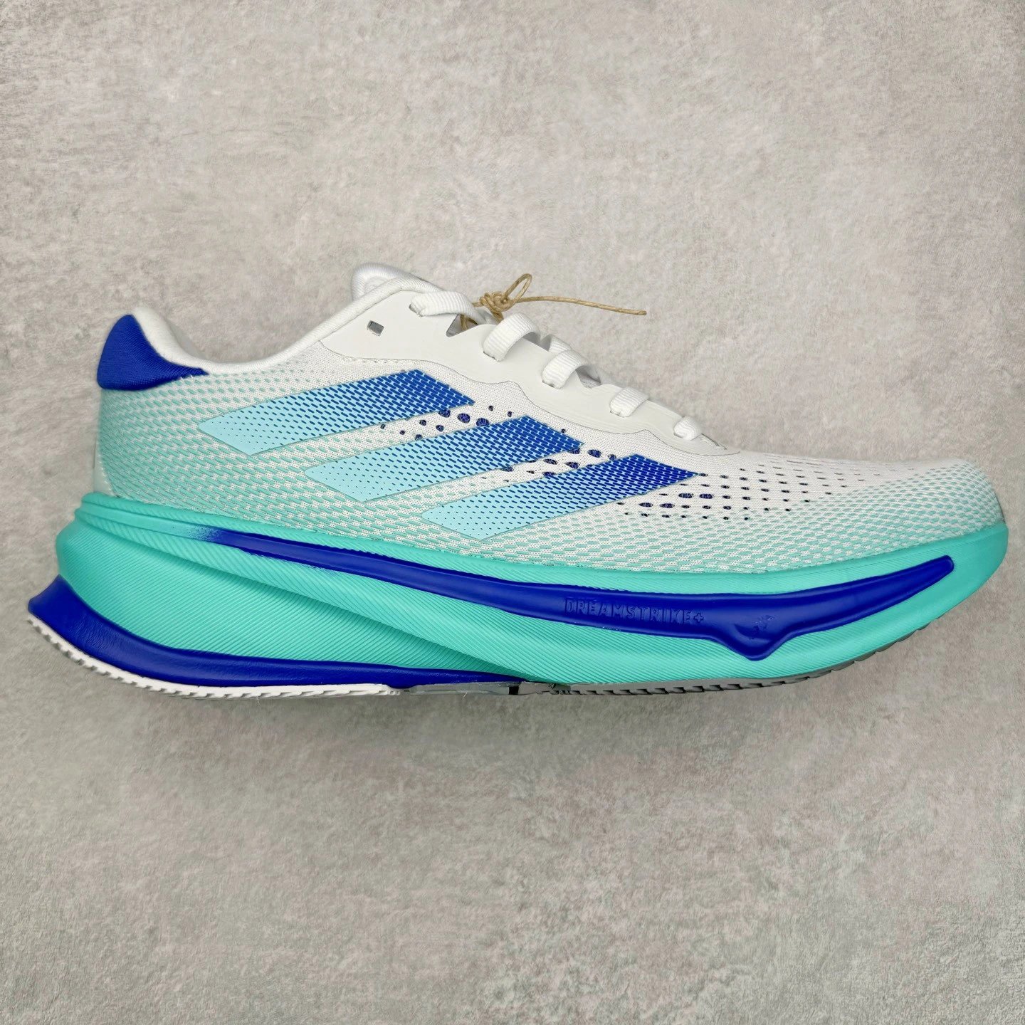 Adidas Sneakers Supernova Rise 5.0 Running Shoes — Blue, green, and white