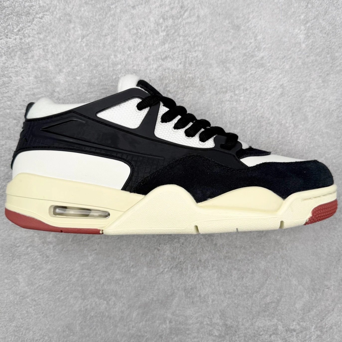 Nike Sneakers Air Jordan 4 RM — Black, white, and red