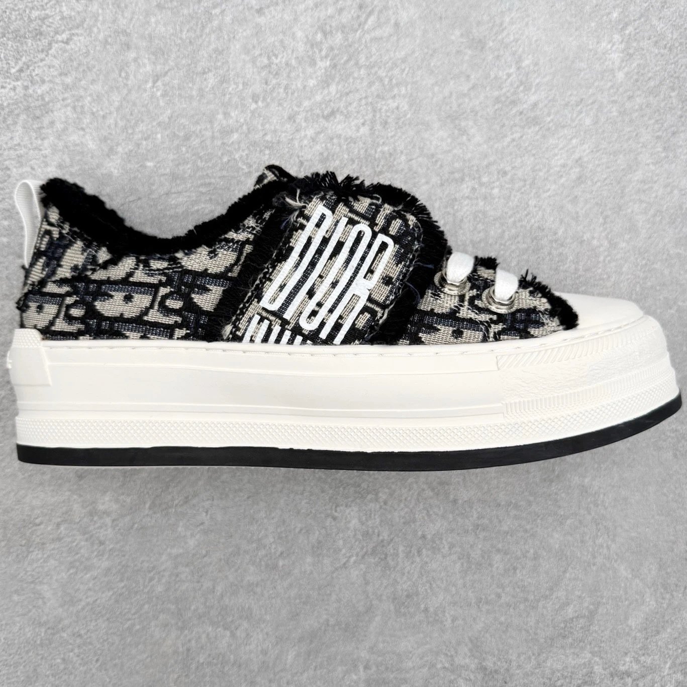 Dior Sneakers Low-Top Platform Canvas with Frayed Logo Strap — Black and white