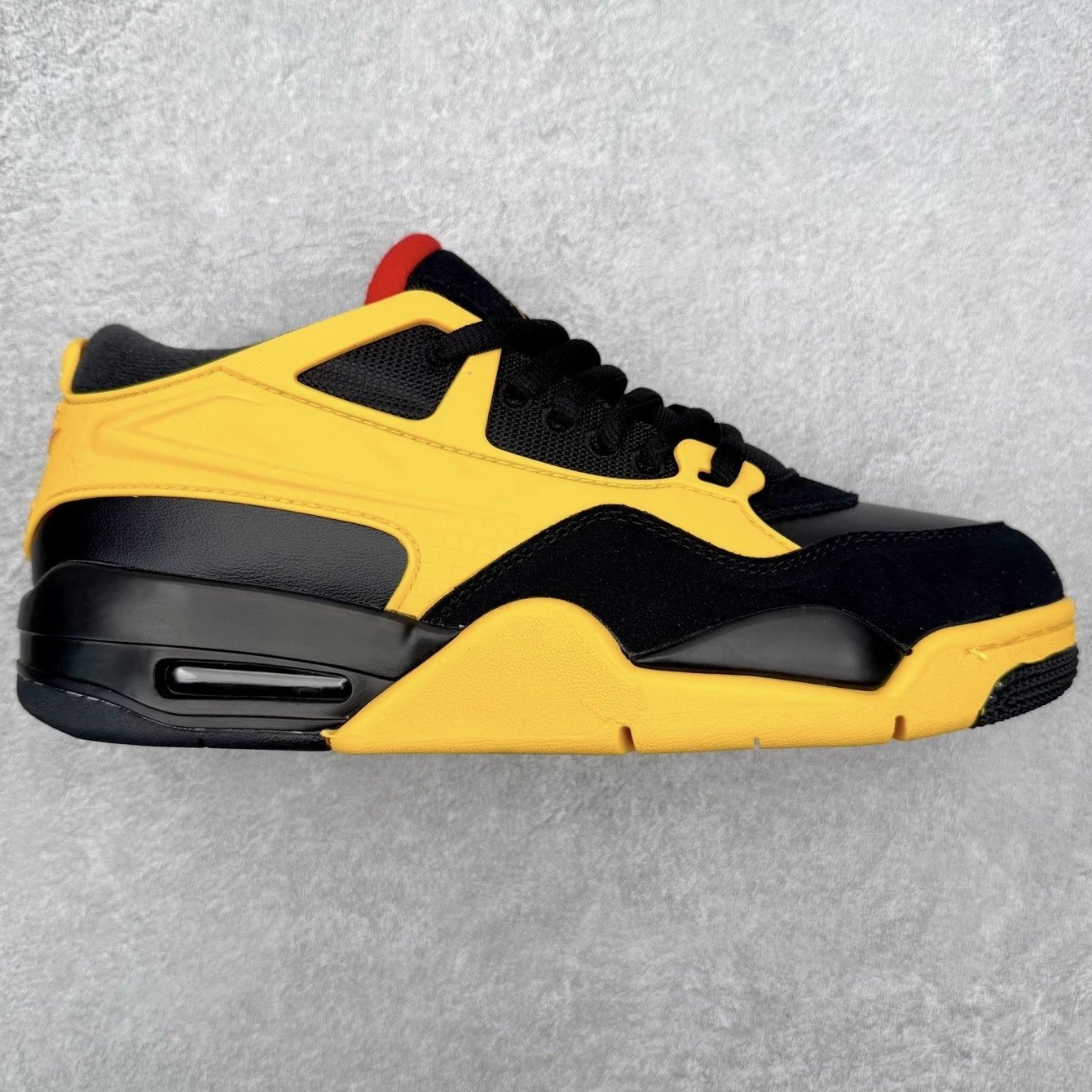 Nike Sneakers Air Jordan 4 RM — Black and yellow