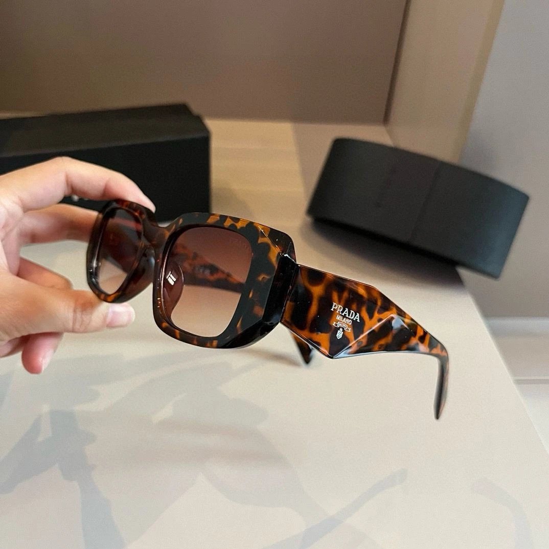 Prada Sunglasses · 4