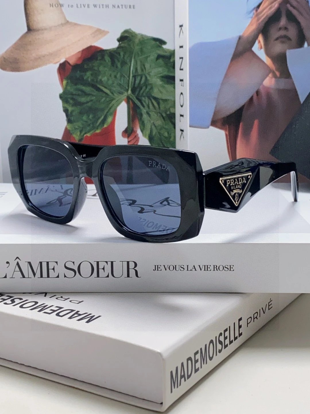 Prada Sunglasses · 5