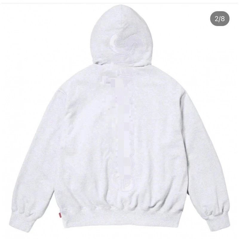 Large letters behind white gray