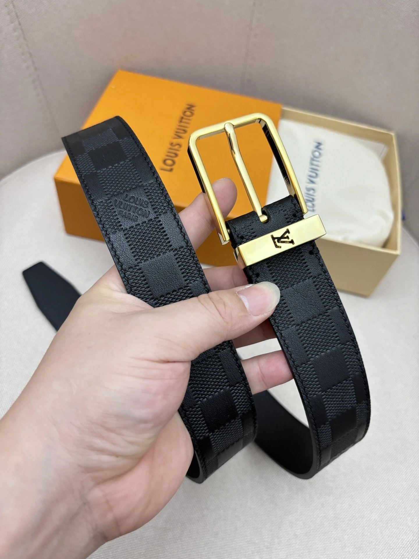 7 # checkered pattern/gold buckle
