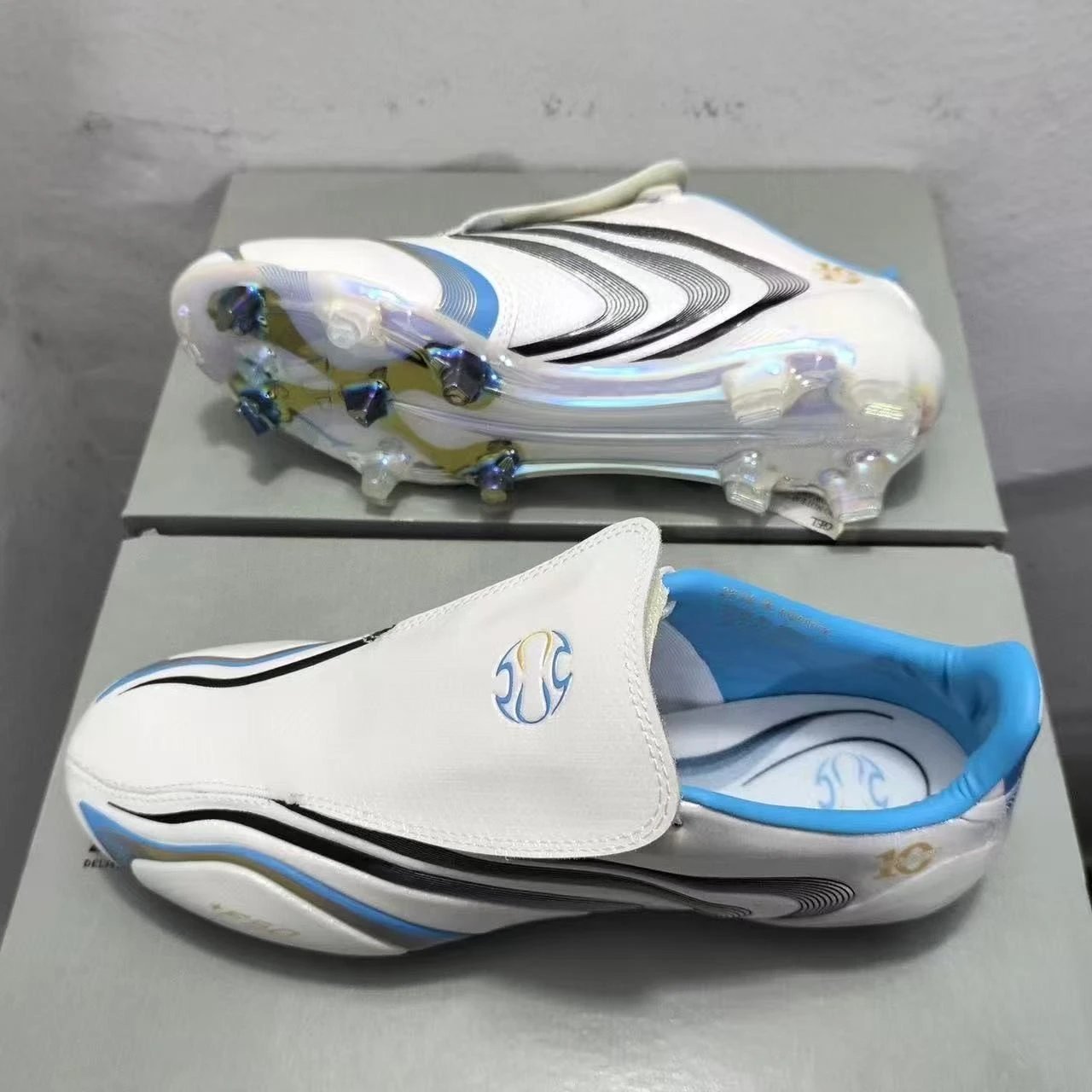 Best batch, no laces, waterproof, F50FG spike student football boots.