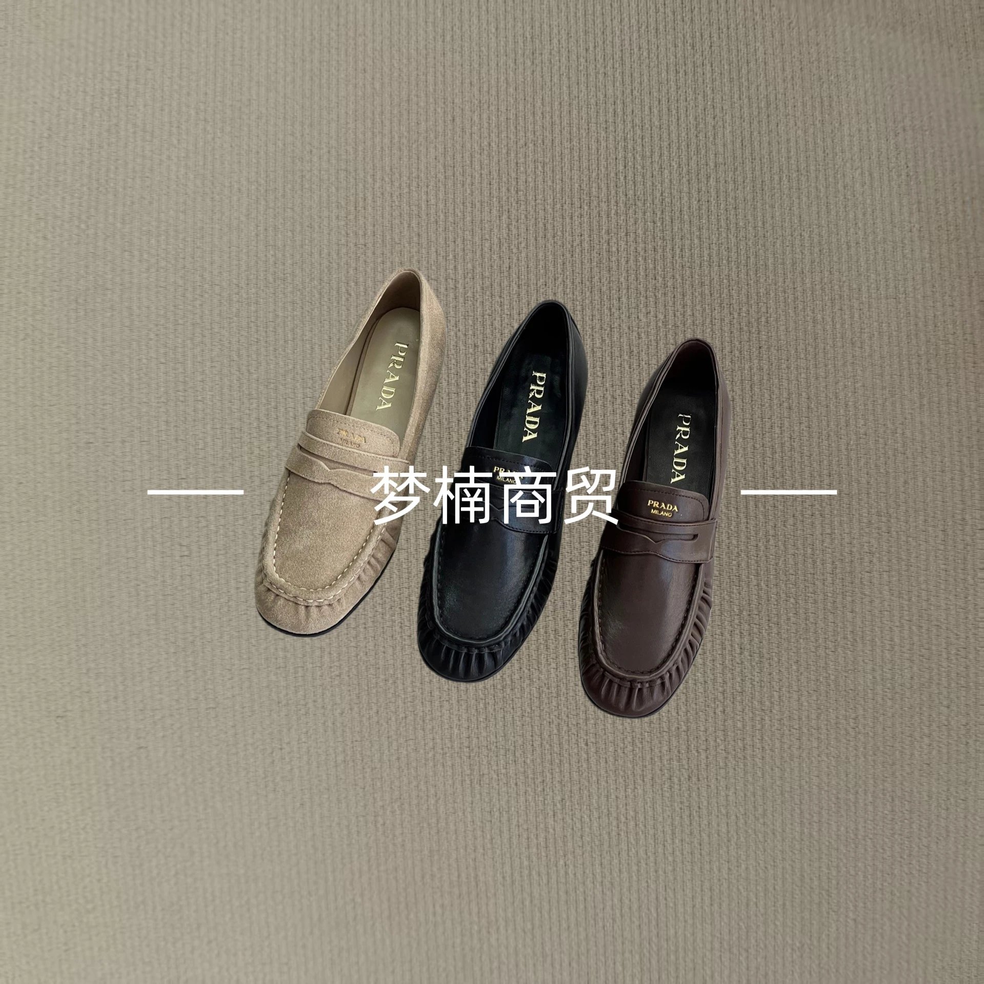 Original PRADA women's slip-on casual loafers with the PRADA logo.
