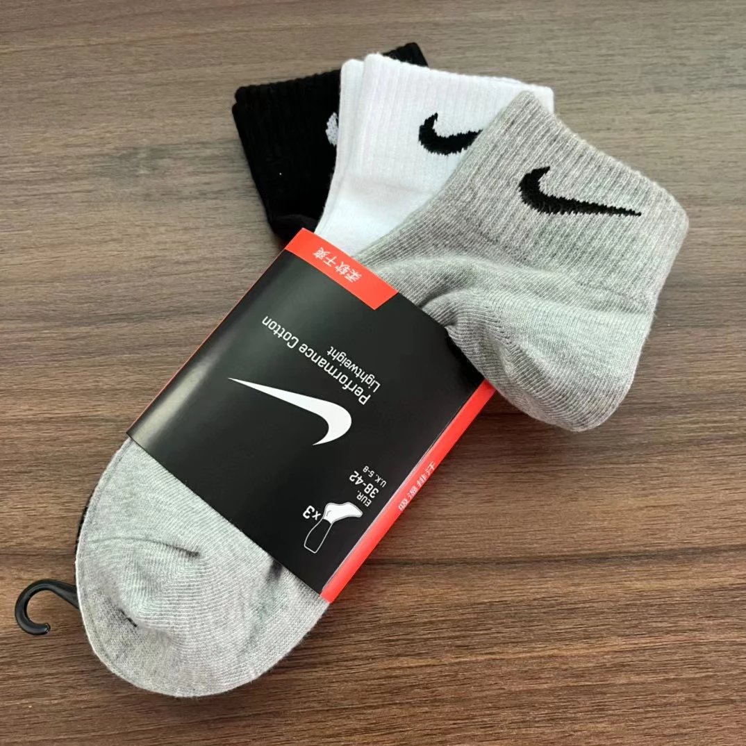 One pair each of orange card black, white and gray