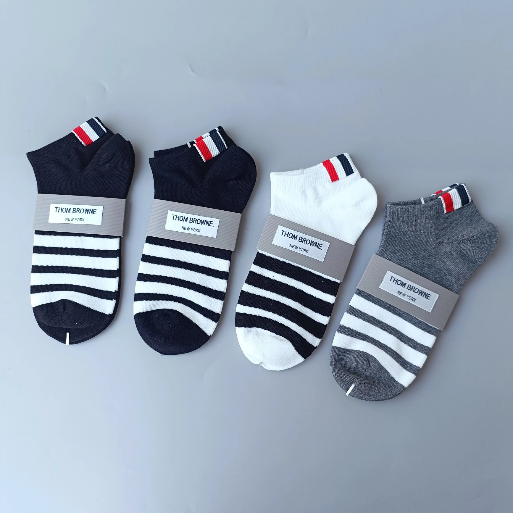 Thom Browne Spring/Summer Classic TB Set Striped Warm and Breathable Women's Ship Socks Casual Men's and Women's Asymmetric Short Socks Ship Socks Pair Price