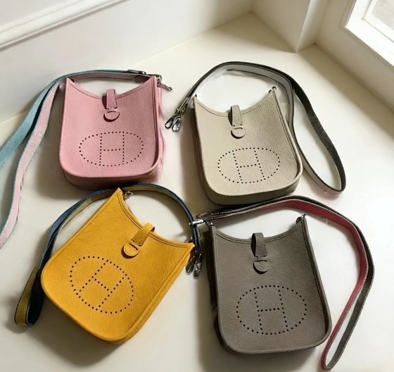 Hermès Evelyne Mini Bag in Calfskin: Timeless Perforated Design, Buckle Closure, Shoulder & Crossbody Strap, Elegant & Practical