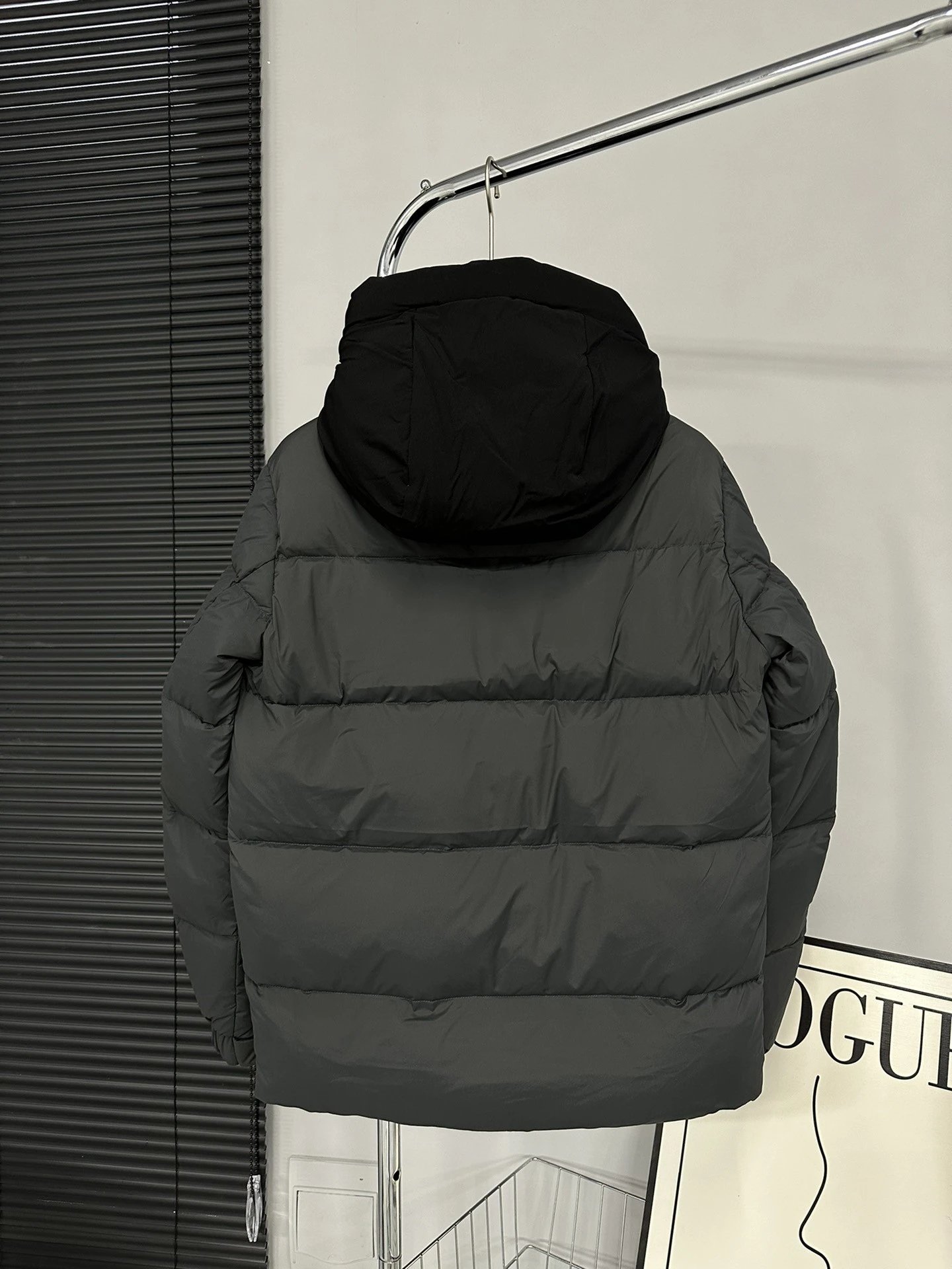 Black Moncler Down Jacket with Detachable Hood and Zippered Pockets