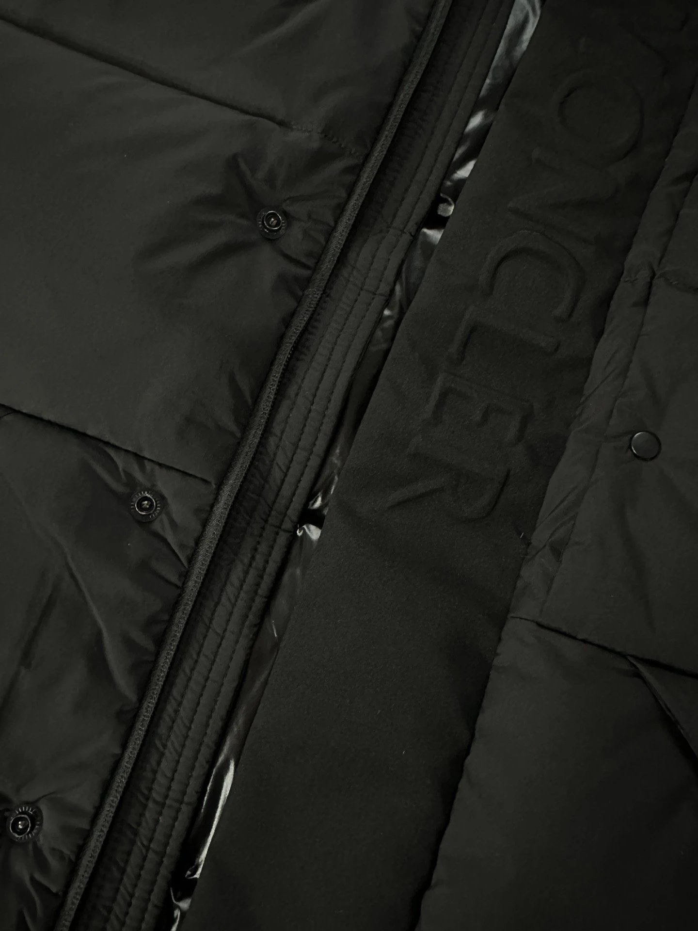 Black Moncler Down Jacket with Detachable Hood and Zippered Pockets