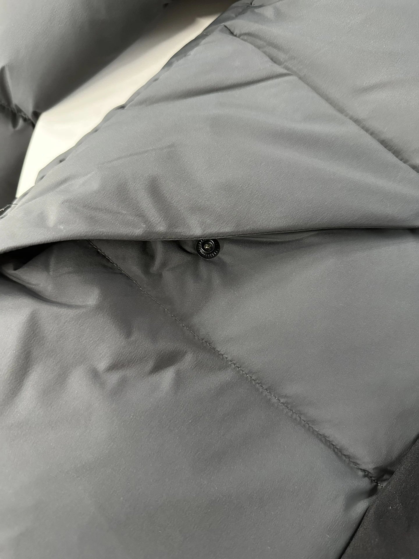 Black Moncler Down Jacket with Detachable Hood and Zippered Pockets