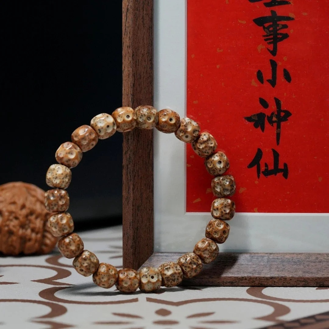 纯天然印度小龙眼菩提子佛珠手串108颗,尺寸5mm,配老星月水滴三 纯天然印度小龙眼菩提子佛珠手串108颗,尺寸5mm,配老星月水滴三